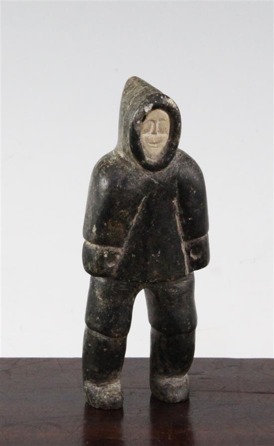 An Inuit carved soapstone figure of a male standing, 5.25in.